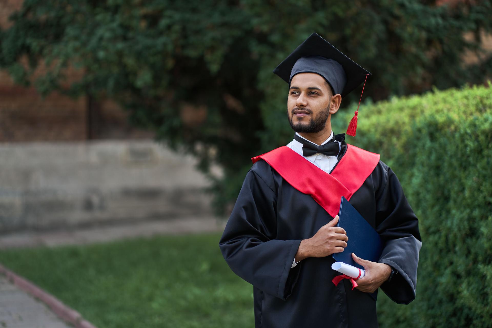 Indian graduate graduation robe with diploma university campus copy 
